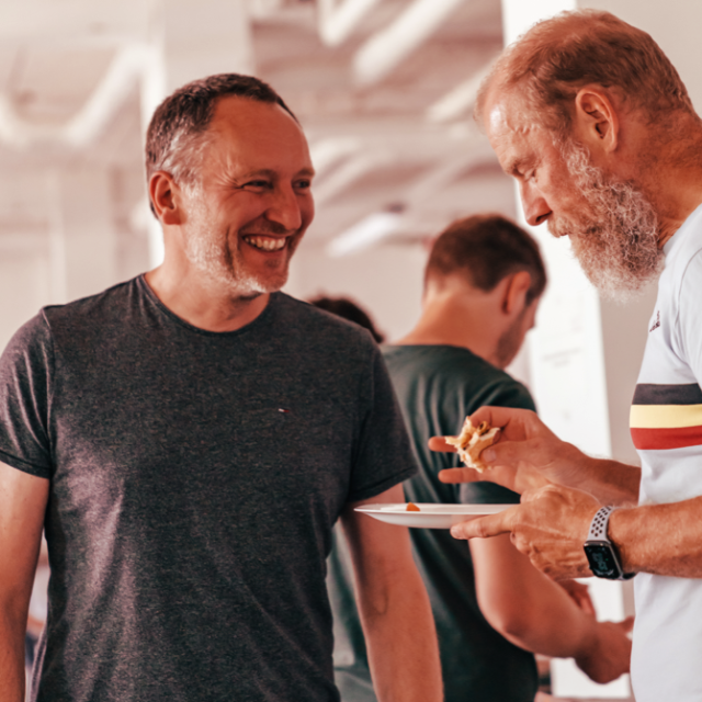 Two men in conversation
